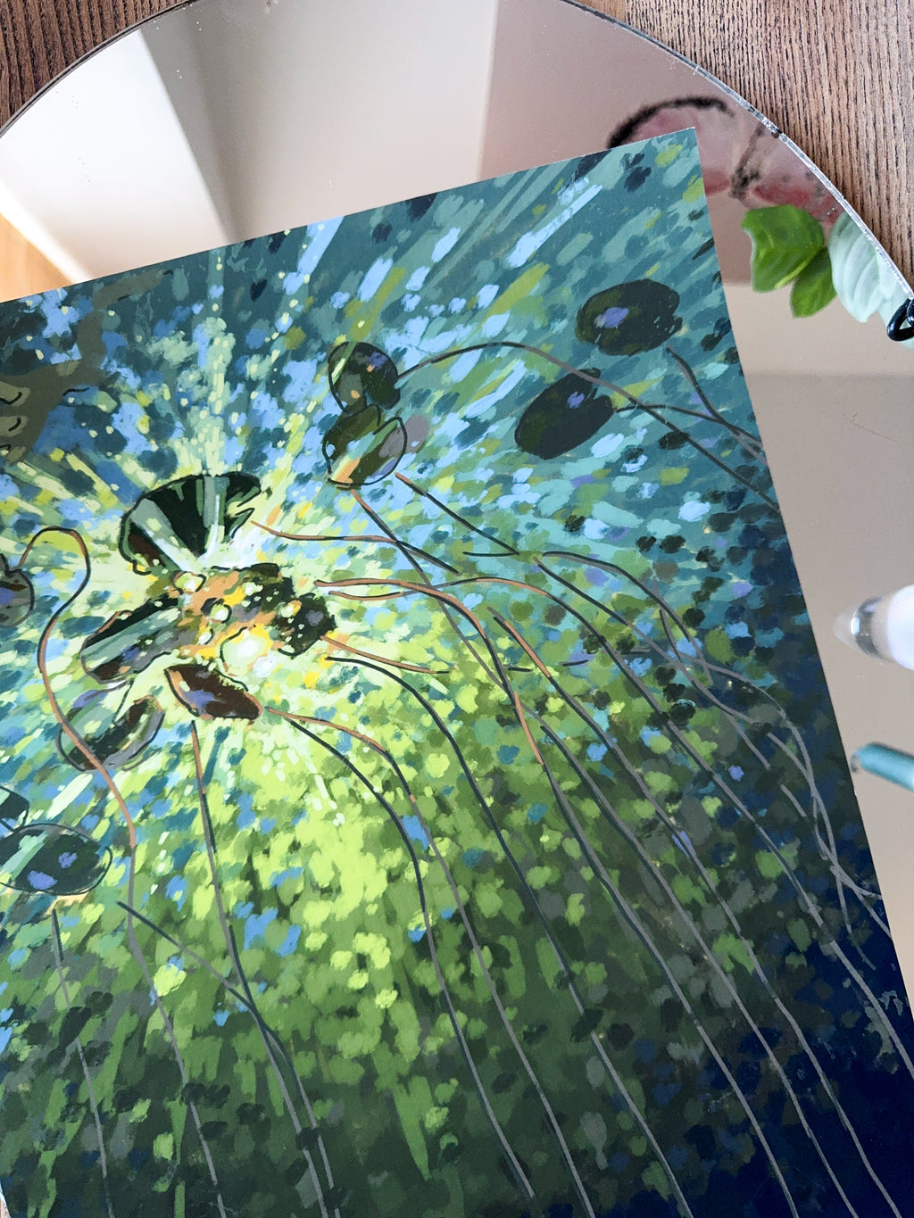 Impressionistic art print of a lake and lily pads in green colors, detailed close up