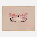 Framed artwork of a pink butterfly on a beige background