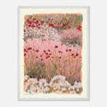 Framed artwork of a floral landscape with pink and green tones.