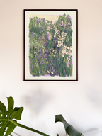 Framed artwork of a floral scene on a beige wall with a plant in the foreground.