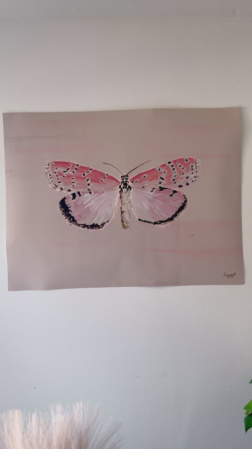 Impressionistic art print of a pink butterfly with beige textured background video