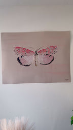 Impressionistic art print of a pink butterfly with beige textured background video